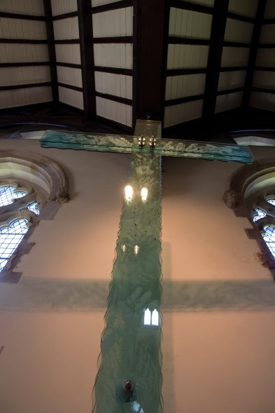 This frosted glass crucifix is an example of the kind of contemporary religious art that can be found in churches like St. John's Church, Ladywood.