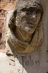 The carved-and now quite weathered-face of the church's namesake, St. John, decorates the exterior of St. John's Church, Ladywood.