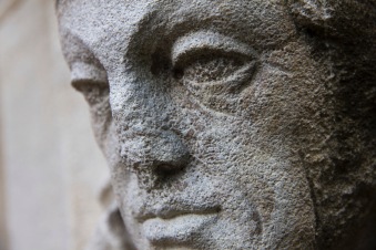 The carved-and now quite weathered-face of a learned man decorates the exterior of St. John's Church, Ladywood.