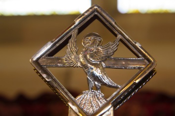 The ornate cross on the altar at St. John's Church, Ladywood, contains a small icon of an eagle signifying that Christians should look unblinkingly at the word of God.