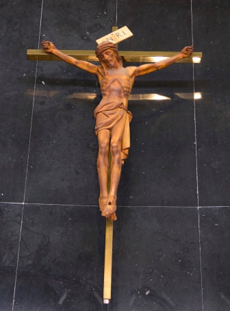 A traditional crucifix, reminding worshipers to reflect upon the suffering of Christ. It is found inside the Catherine of Sienna Roman Catholic church, central Birmingham.